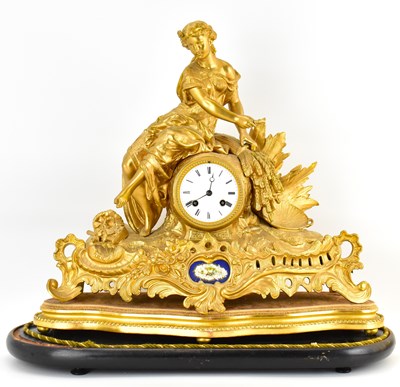 Lot 148 - A 19th century gilt metal mantel clock, the...