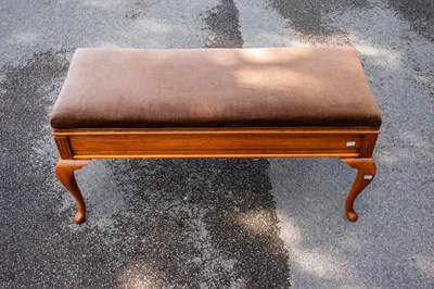 Lot 2446 - An early 20th century walnut piano duet stool,...