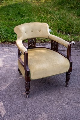 Lot 2503 - An Edwardian walnut tub chair on turned supports.
