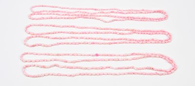 Lot 717 - A three strand stained pink freshwater pearl...