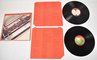 Lot 372 - A Beatles 1962-1966 red vinyl record with red...