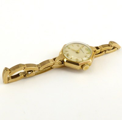 Lot 1159 - GARRARD; a ladies' 9ct gold wristwatch, the...