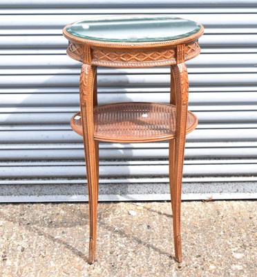 Lot 39 - A reproduction French style oval side table...