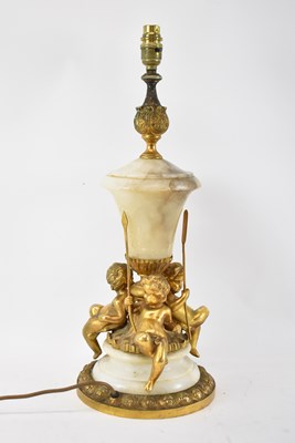 Lot 78 - An early 20th century alabaster and gilt metal...