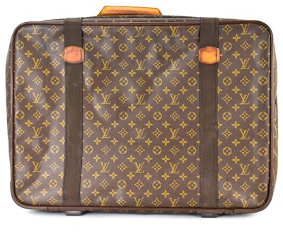 Lot 361 - LOUIS VUITTON; a medium-sized suitcase with...