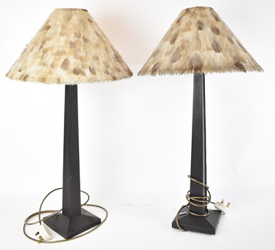 Lot 83 - A pair of modern leather table lamps with...