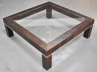 Lot 41 - A large modern crocodile effect coffee table...