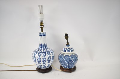 Lot 84 - A Chinese style blue and white baluster form...