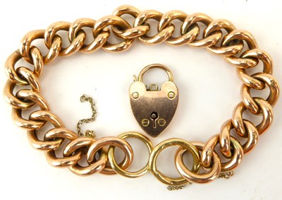 Lot 1020 - A 9ct rose gold hollow link bracelet united...