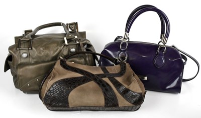 Lot 714 - COCCINELLE; a purple patent leather hand and...