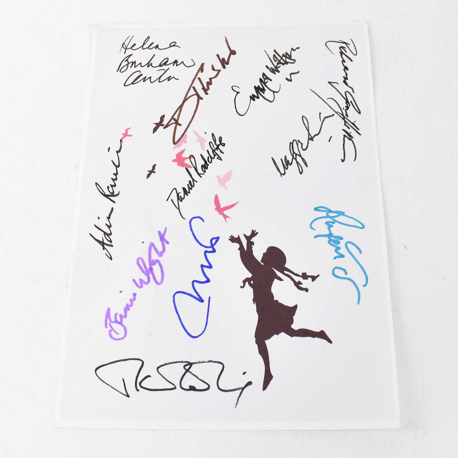 Lot 754 - HARRY POTTER; an A4 card bearing signatures of...