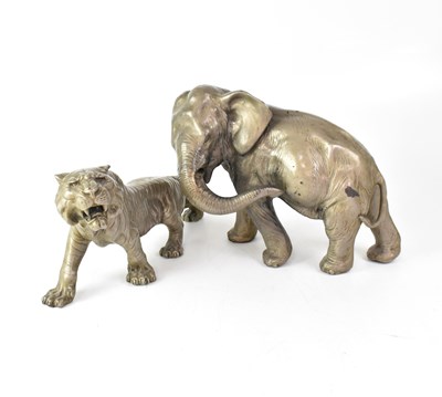 Lot 510 - A pewter elephant, 19 x 26cm (af), and a...