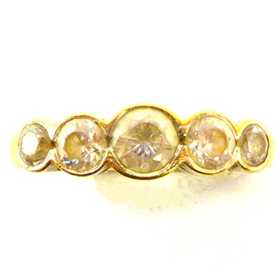 Lot 1009 - A 9ct gold dress ring with five graduated...