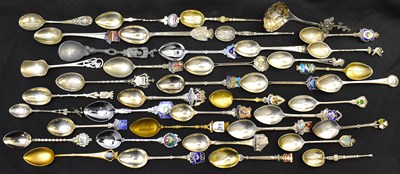 Lot 800 - A collection of tourist souvenir spoons, to...