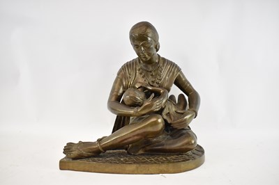 Lot 578 - A large Indian bronze figure of a mother...