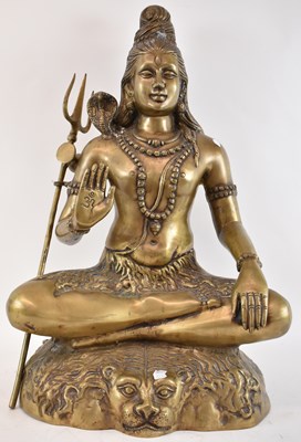 Lot 582 - A large Indian brass statue of Shiva, height...