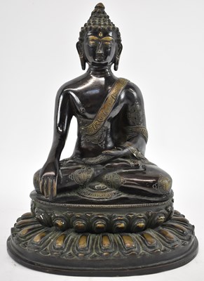 Lot 579 - An Indian bronze figure of a Buddha, height 29cm.