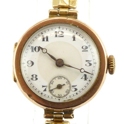 Lot 1183 - A vintage 9ct gold wristwatch, the white...