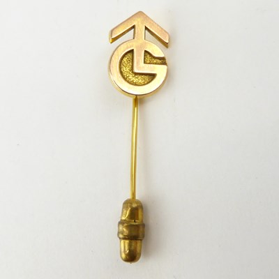 Lot 1057 - GRANADA TV; a 9ct gold pin featuring the...