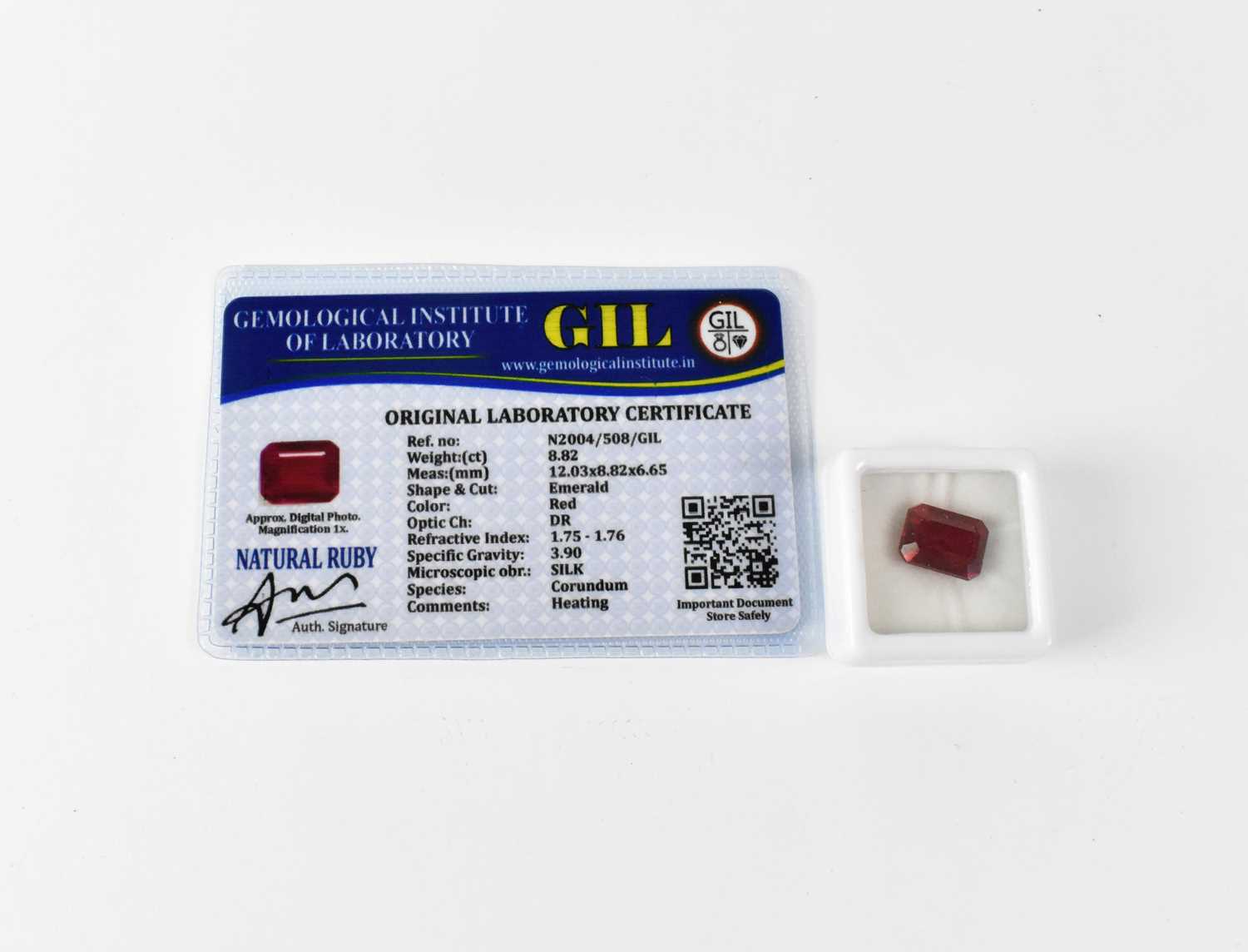 Lot 1038 - A loose 8.82ct emerald-shaped ruby with GIL...