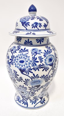 Lot 474 - A large blue and white baluster jar and cover...