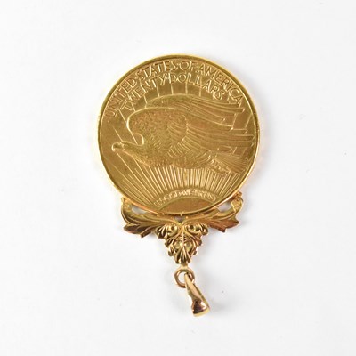 Lot 827 - A 1909 gold $20 coin, in pendant mount, approx....