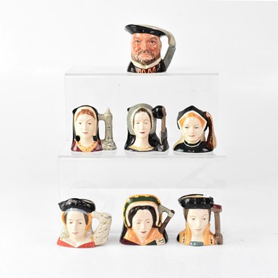 Lot 398 - ROYAL DOULTON; a set of seven character jugs...