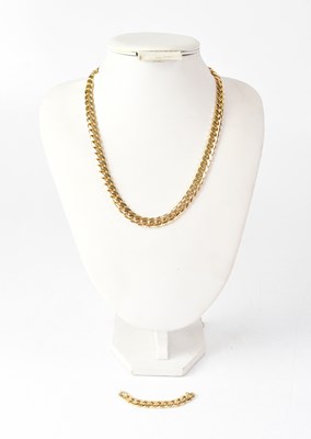 Lot 1060 - A 9ct gold flat curb necklace with lobster...