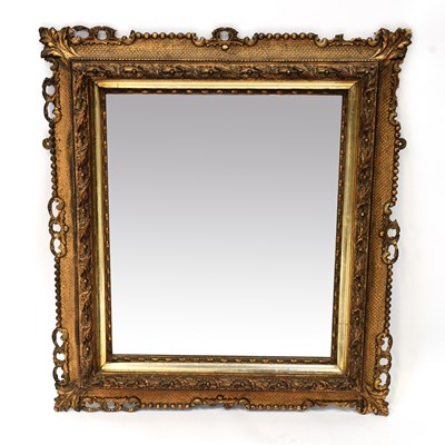 Lot 116 - A late 19th century bevel edged mirror in...