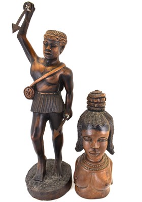 Lot 207 - Two modern African carved wood figures, one of...