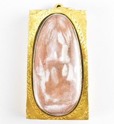 Lot 1062 - A high carat Thai gold rectangular pendant,...