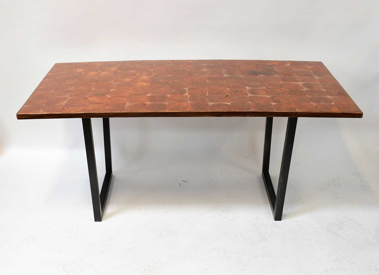 Lot 3 - A modern designer steel framed table, the top