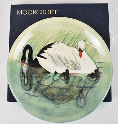 Lot 430 - MOORCROFT; a limited edition green ground dish...