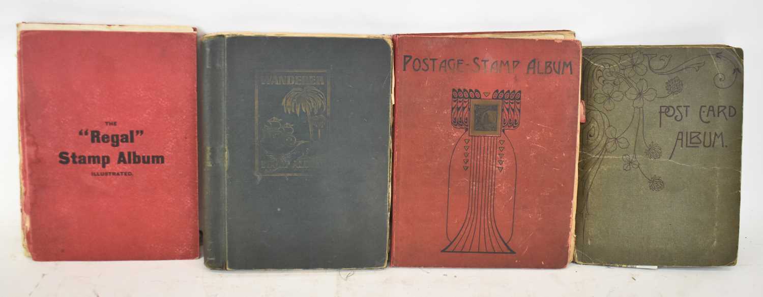 Lot 443 - Three early stamp albums and a postcard album,...