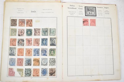 Lot 443 - Three early stamp albums and a postcard album,...