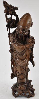 Lot 554 - A Chinese rootwood carving of Shou Lao, height...