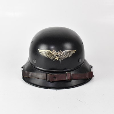 Lot 571 - A WWII period German Luftschutz helmet,...