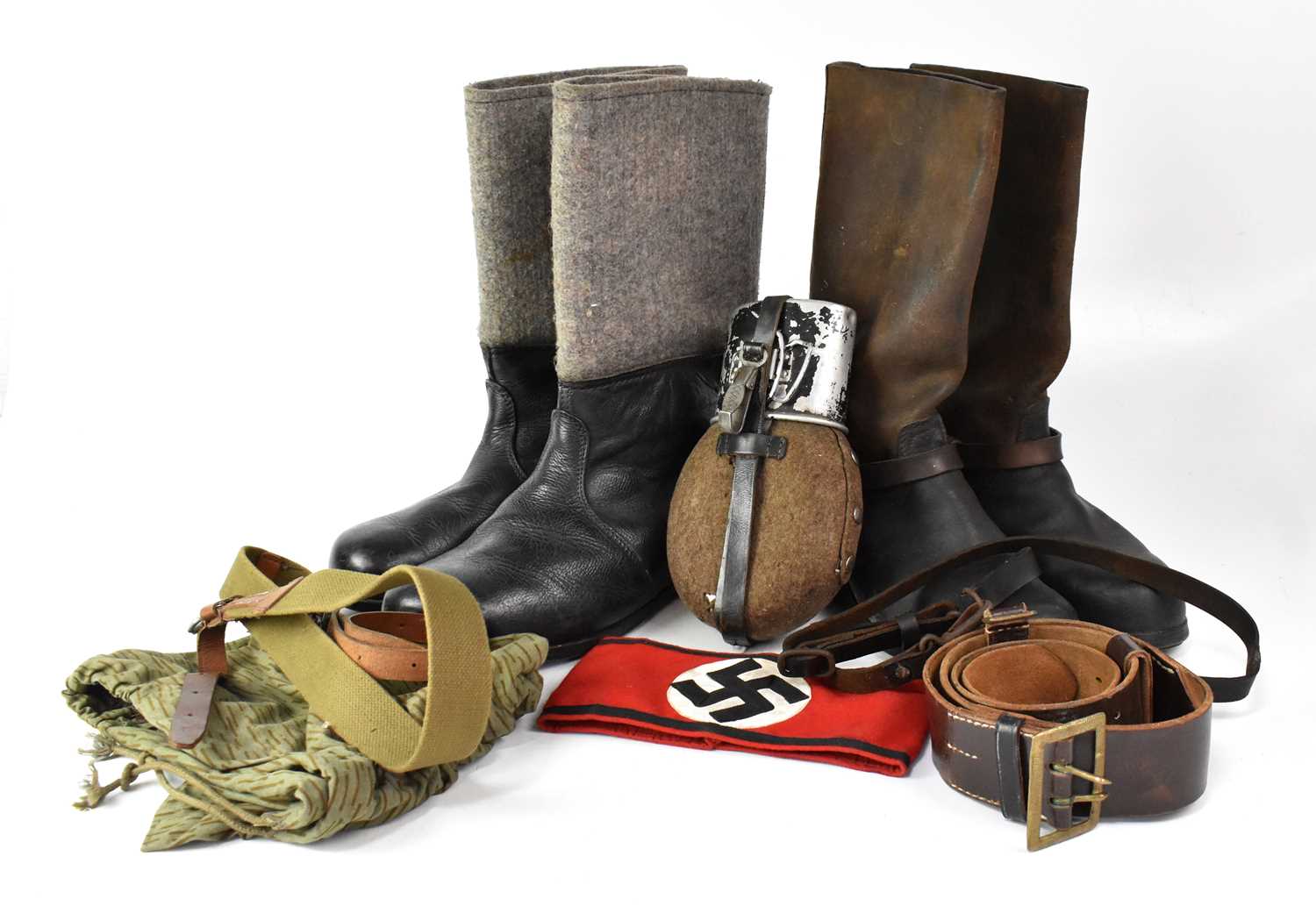 Lot 563 Various military uniform items, including