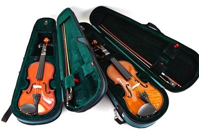 Lot 695 - Two beginners' violins, half-size and...