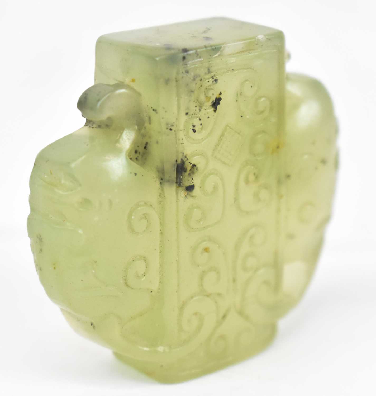 Lot 567 - A Chinese green hardstone carving, height