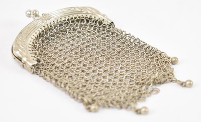 Lot 665 - An Eastern white metal mesh purse.