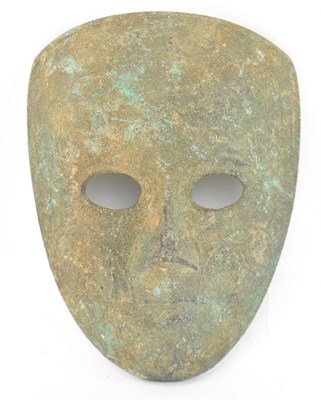 Lot 534 - An Eastern/Islamic bronze mask, 14.5 x 11cm.