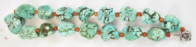 Lot 765 - A large turquoise stone necklace, 234g.