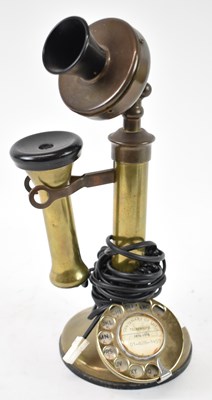 Lot 270 - A vintage brass candlestick telephone, height...