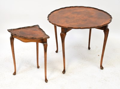 Lot 23 - A reproduction burr walnut circular occasional...