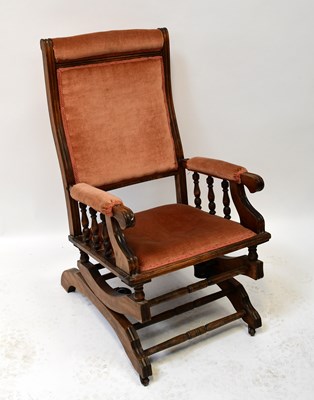 Lot 40 - An early 20th century American rocking chair.