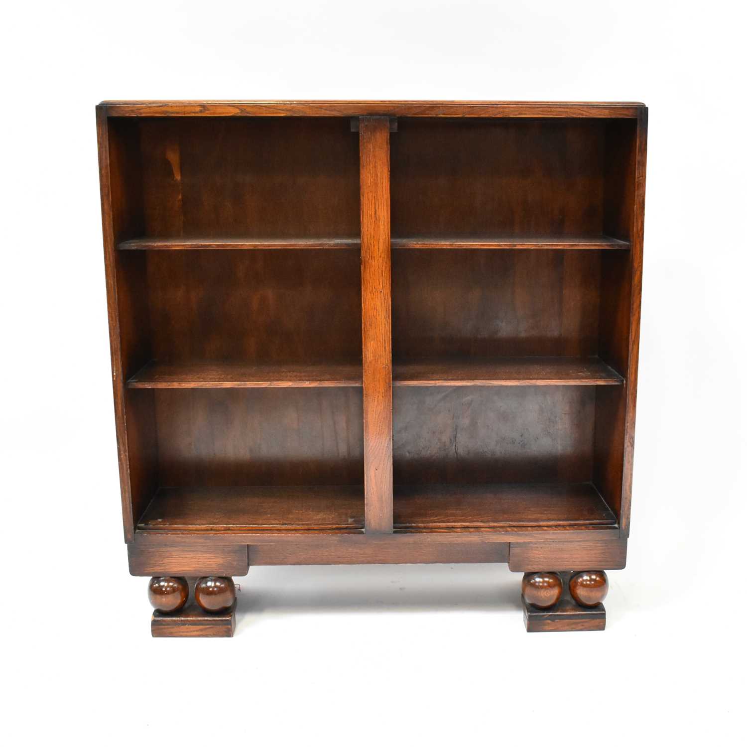 Lot 47 - A 1940s oak open three-shelf bookcase, 96 x