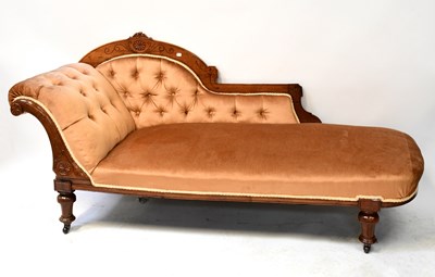 Lot 88 - A Victorian carved mahogany chaise longue with...