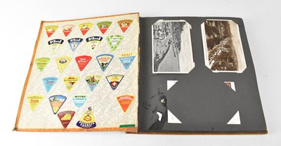 Lot 746 - An early 20th century postcard album, the...