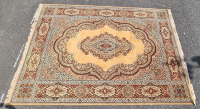 Lot 129 - A large contemporary mustard yellow ground rug...